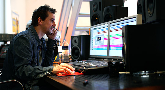 Record producer Alex Silva at Mayfair recording studios talks on camera about his record production