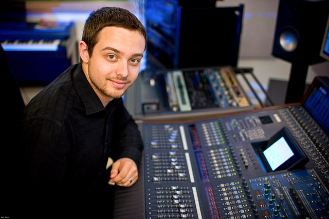 chief engineer simon behind the mixing desk controls at high barn studios