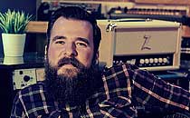 Al Groves shows Russell Cottier around the Motor Museum Studios