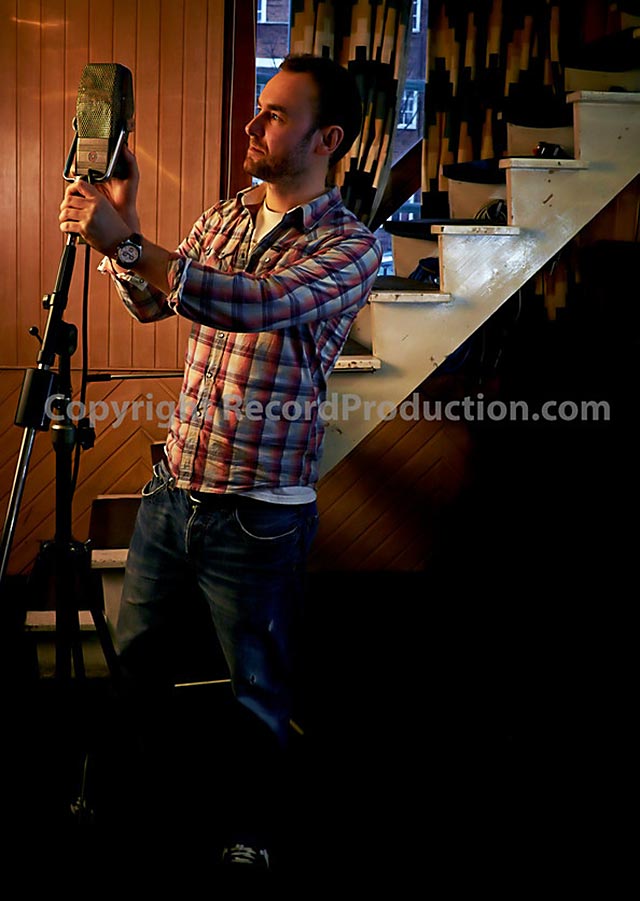 guy massey adjusts a microphone at RAK Studios