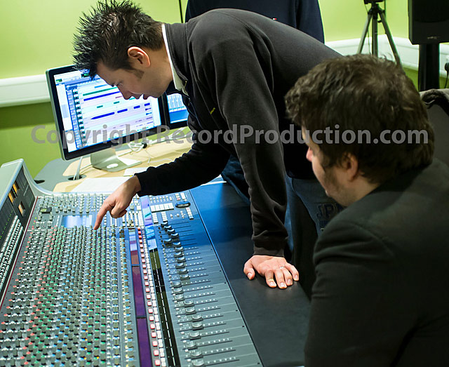andrew lowe at the ssl aws 900 working on the drum sound