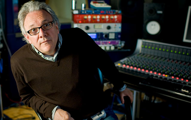 record producer trevor horn in front of his ssl aws 900+ mixing console